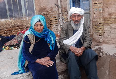 Abdul, 80, and Halima, 75, fled from Shindand District to Herat due to conflict and lack of food.